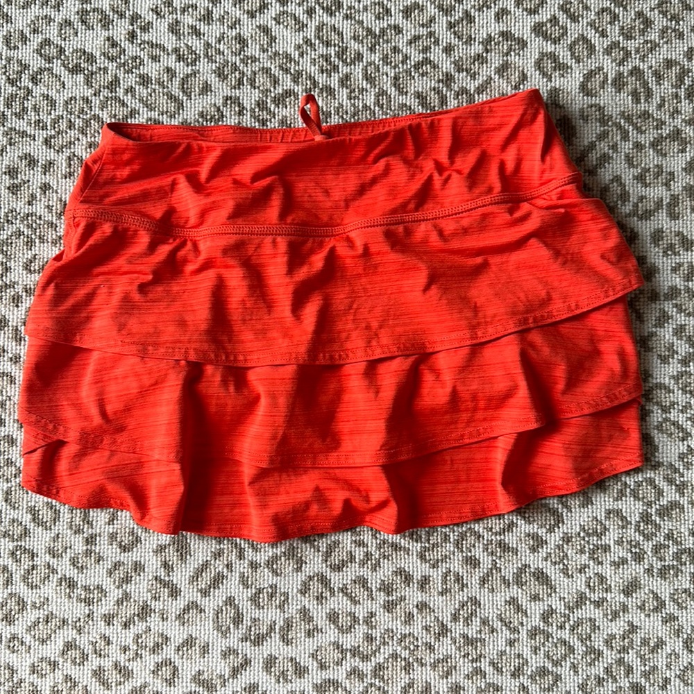 Athleta orange tennis skirt size small